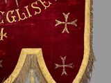 an image of a red and gold banner with a cross