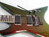 an image of a green and brown electric guitar sitting on a white surface