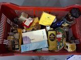 a red basket full of various items in it