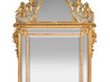 an image of a gold framed mirror on a white background