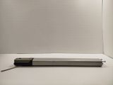 an image of a light box with a pen on it