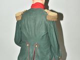 an image of a toy soldier sitting on a chair