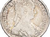 a close up of a coin on a white background