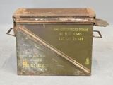 a small metal box with a handle on it