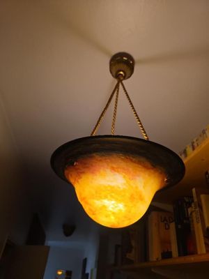 a light that is hanging from the ceiling in the room