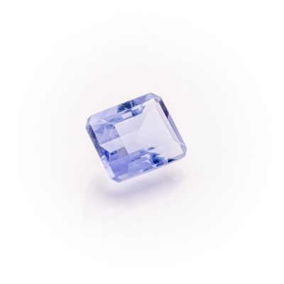 a blue sapphire stone on a white background