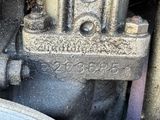 a close up view of a metal valve with a number on it