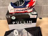 the helmet is sitting on top of the box on the table