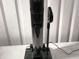an image of a vacuum cleaner sitting on top of a white table