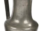 a silver vase with a handle on a white background