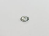a close up of a white diamond on a white surface