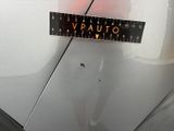 a close up of a sticker on the hood of a car