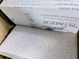a box full of papers sitting on top of a table