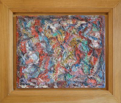 an abstract painting in a wooden frame on a wall