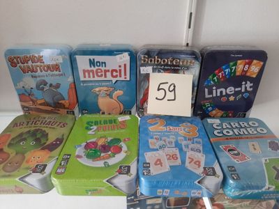 several children ' s board games are on a shelf with a price tag
