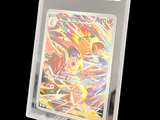 a pokemon card in a clear plastic holder on a black background
