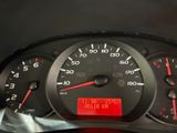 a close up of a speedometer on a car ' s dashboard