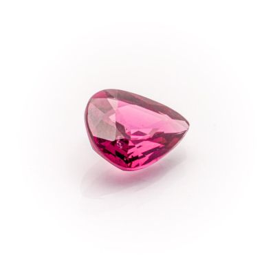 a pink tourmaline gems on a white background