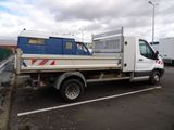 a white truck that is parked in a parking lot