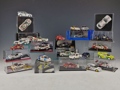a lot of toy cars that are in a display case