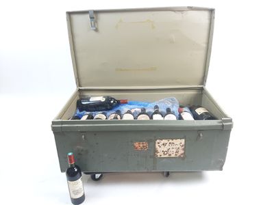 a suitcase with a bottle of wine and a bottle of wine in it