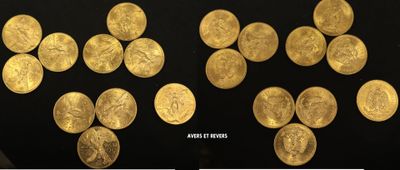 the gold coins are being displayed in a display case