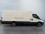 a white van that is parked in a parking lot
