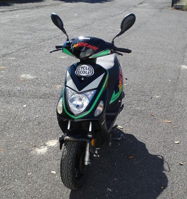 a motorcycle that is parked on the side of the road