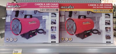 two boxes of air conditioners on display in a store