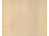 an old photo of a piece of paper on a white surface