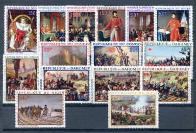 a group of stamps with pictures of military men on them