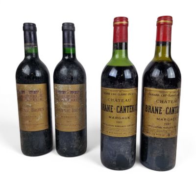 trois bouteilles de vin posées les unes à côté des autres sur une surface blanche