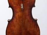the back of an old violin with a wooden back and strings