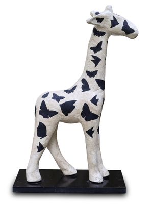 statue of a giraffe on a black base on a white background