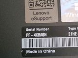 a close up of a computer keyboard with a qr code on it