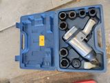 a blue tool box with tools in it on the floor