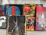 many paintings on the wall of a building