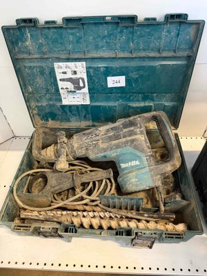 a tool in a case on a shelf in a room