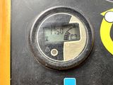 a close up of a clock on the side of a building