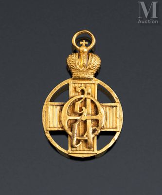 an image of a gold cross with a crown on top of it