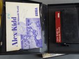 a box with a book and a cassette inside of it