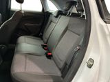 the back seats of a white car with black trims