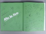 an open book with a bunch of autographs written on it
