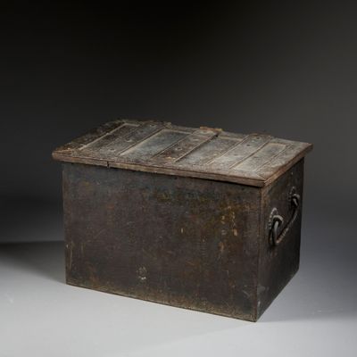 an old wooden box with a lock on it
