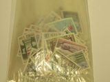 a bag full of stamps sitting on a table