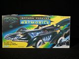 a box with a toy batmobile on it