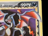 a close up of a pokemon card with a dragon on it