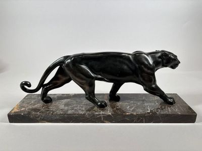 statue of a black panther on a marble base on a white background