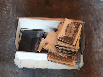 a box full of old photos and old books