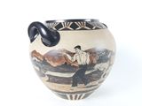 a vase with a picture of a man and a dog on it
